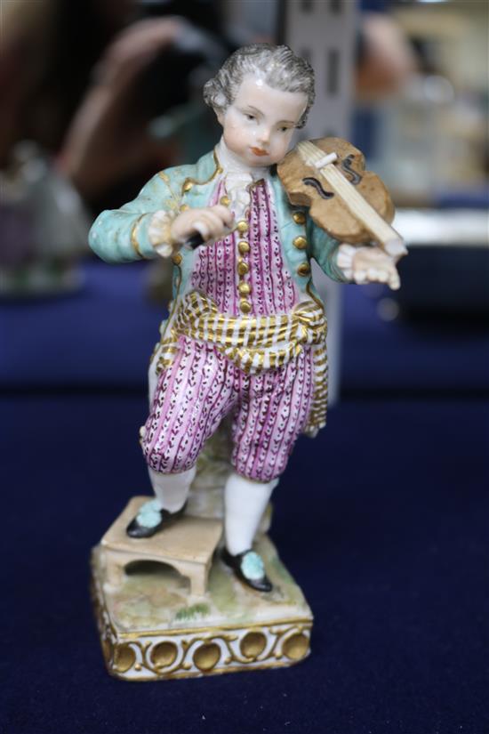 A Meissen figure of a boy violinist
